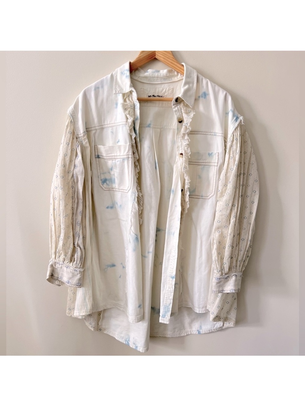 We The FREE People "Faded By The Sun" shirt features ruffled details